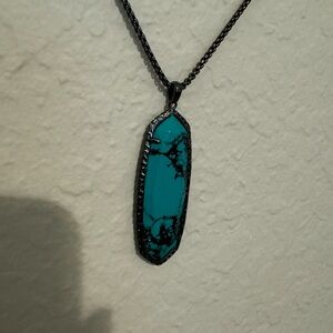 Long necklace in gunmetal with turquoise and black marbeled pendant